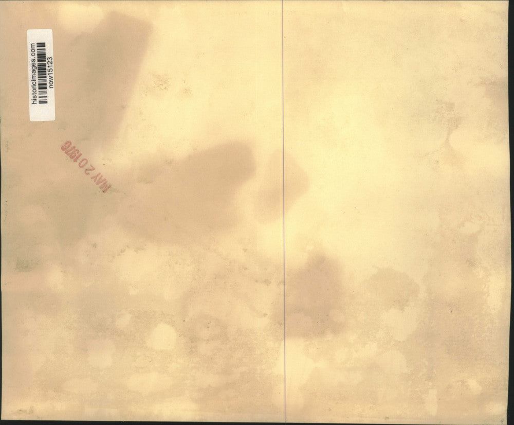 1976 Press Photo Israeli trooper hold two beverages while standing Guard Duty.