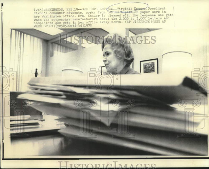 Load image into Gallery viewer, 1970 Press Photo Consumer Advocate Virginia Knauer behind piles of paper work
