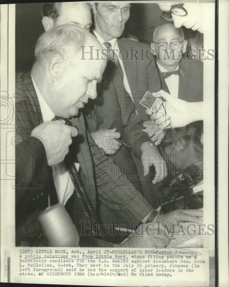 1966 Press Photo Foster Johnson signs filing papers as candidate for US Senate