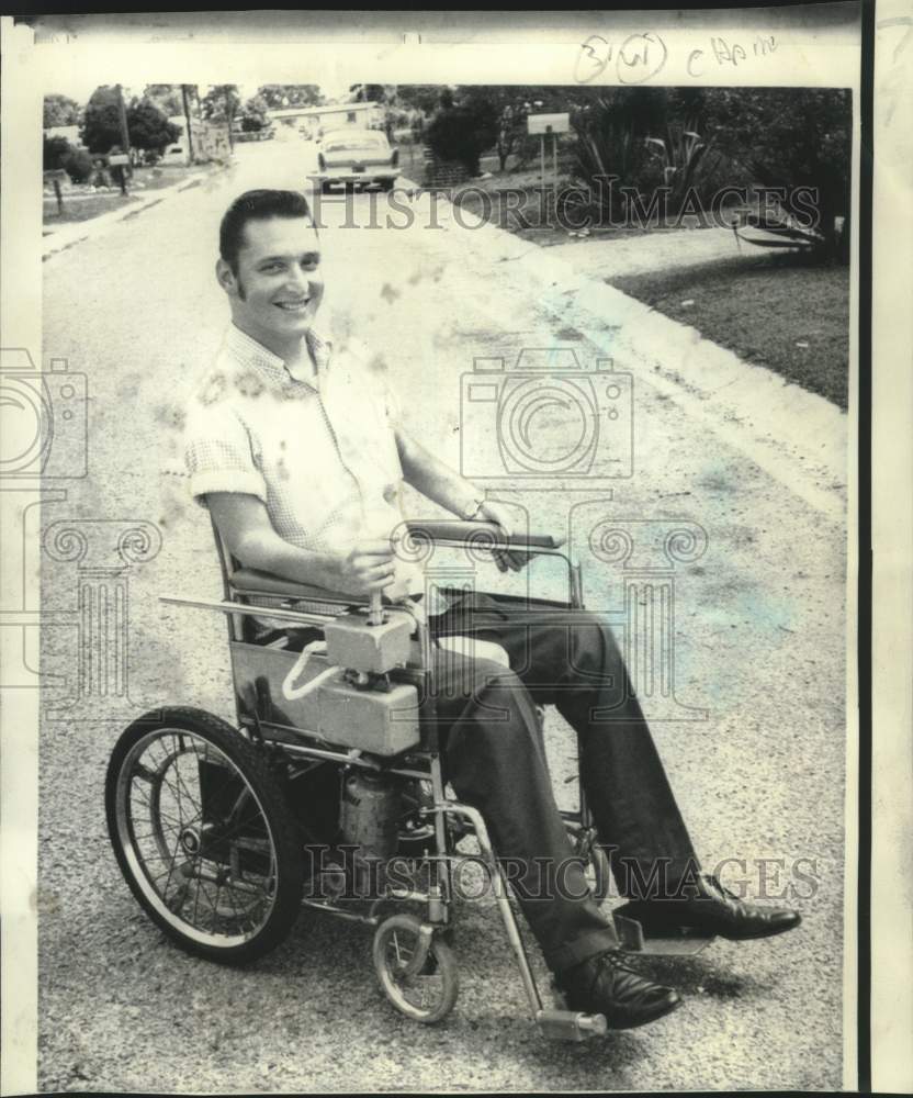 1969 Press Photo Ray Lewis, injured in swimming pool accident uses wheelchair