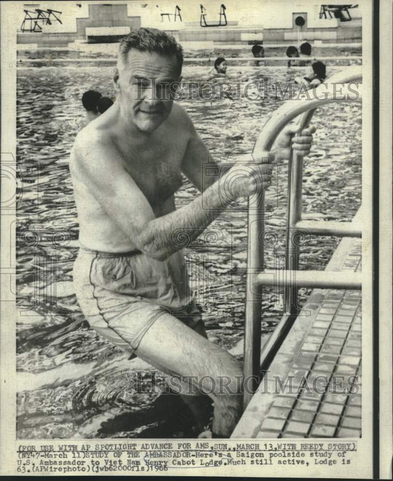 Load image into Gallery viewer, 1966 Press Photo Ambassador Henry Cabot Lodge, poolside at Saigon hotel
