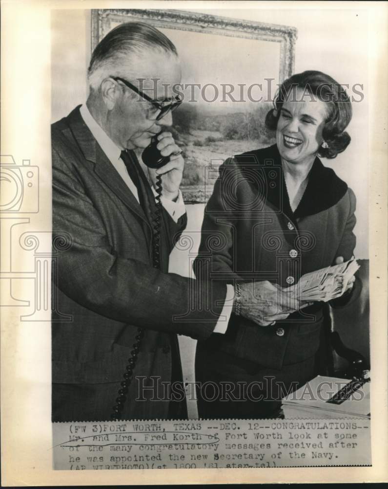 Load image into Gallery viewer, 1961 Press Photo Congratulations to Secretary of the Navy Fred Korth and wife
