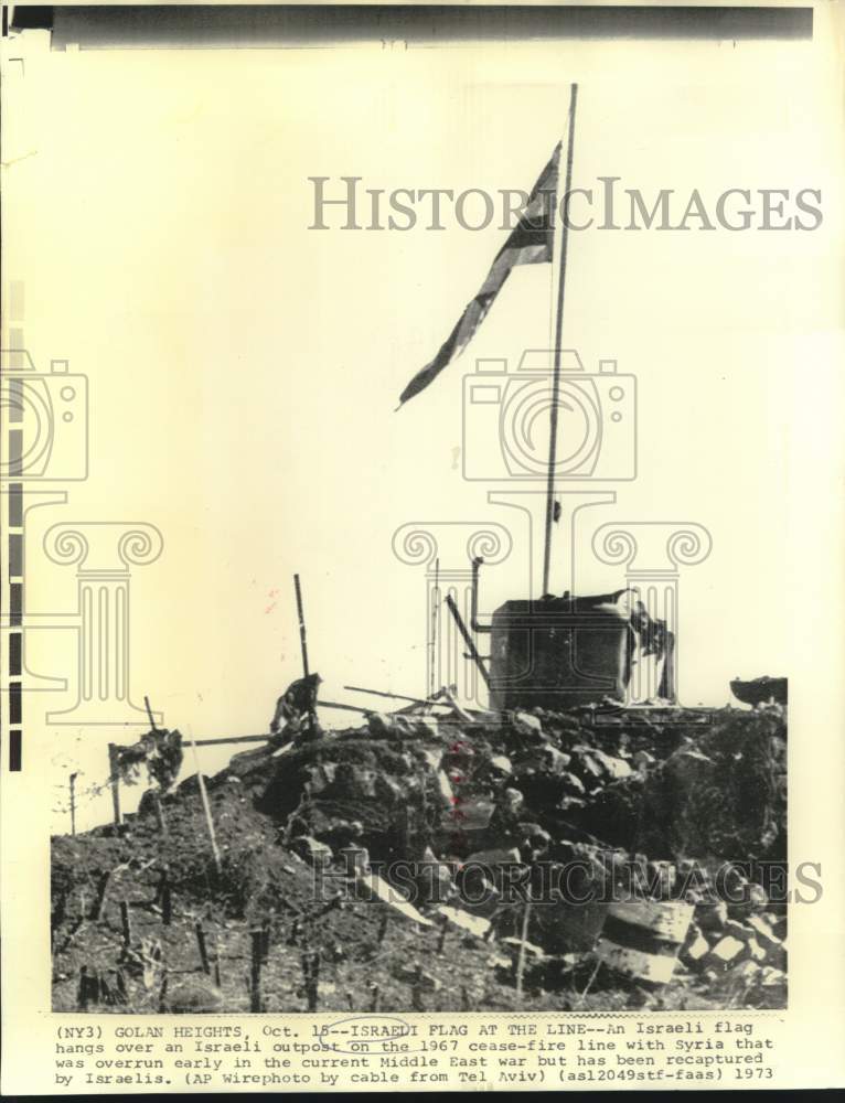 Load image into Gallery viewer, 1973 Press Photo Israeli flag over Israeli outpost at cease-fire line with Syria
