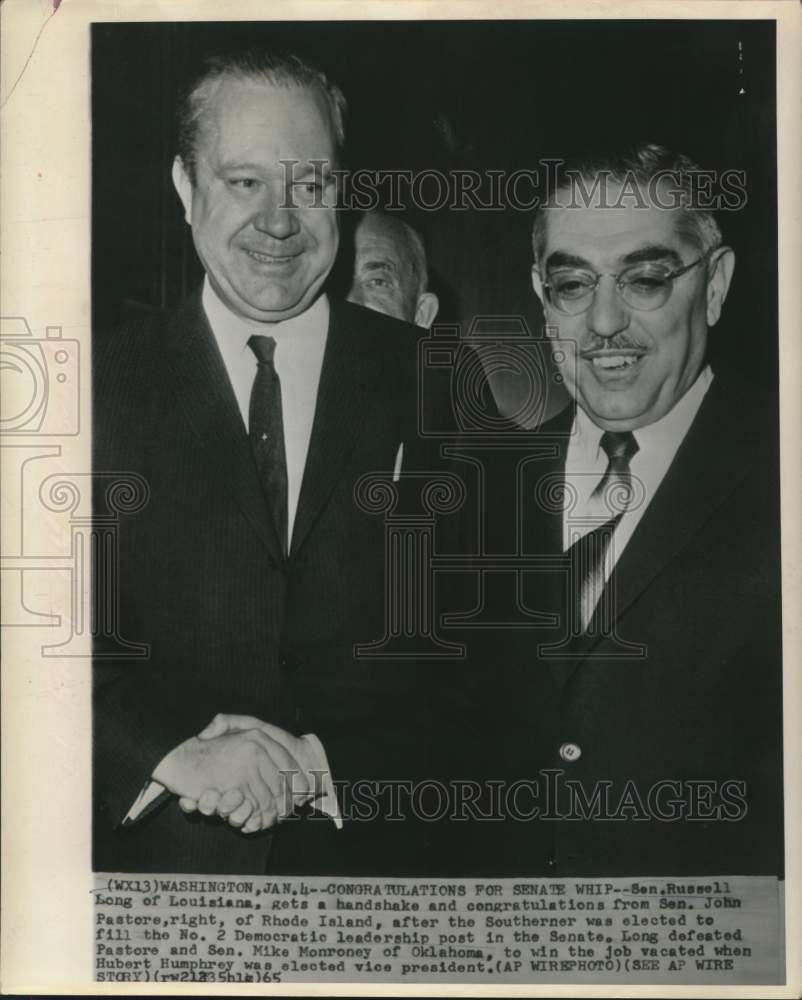 1965 Press Photo Senator Russell Long gets handshake from Senator Pastore in WA