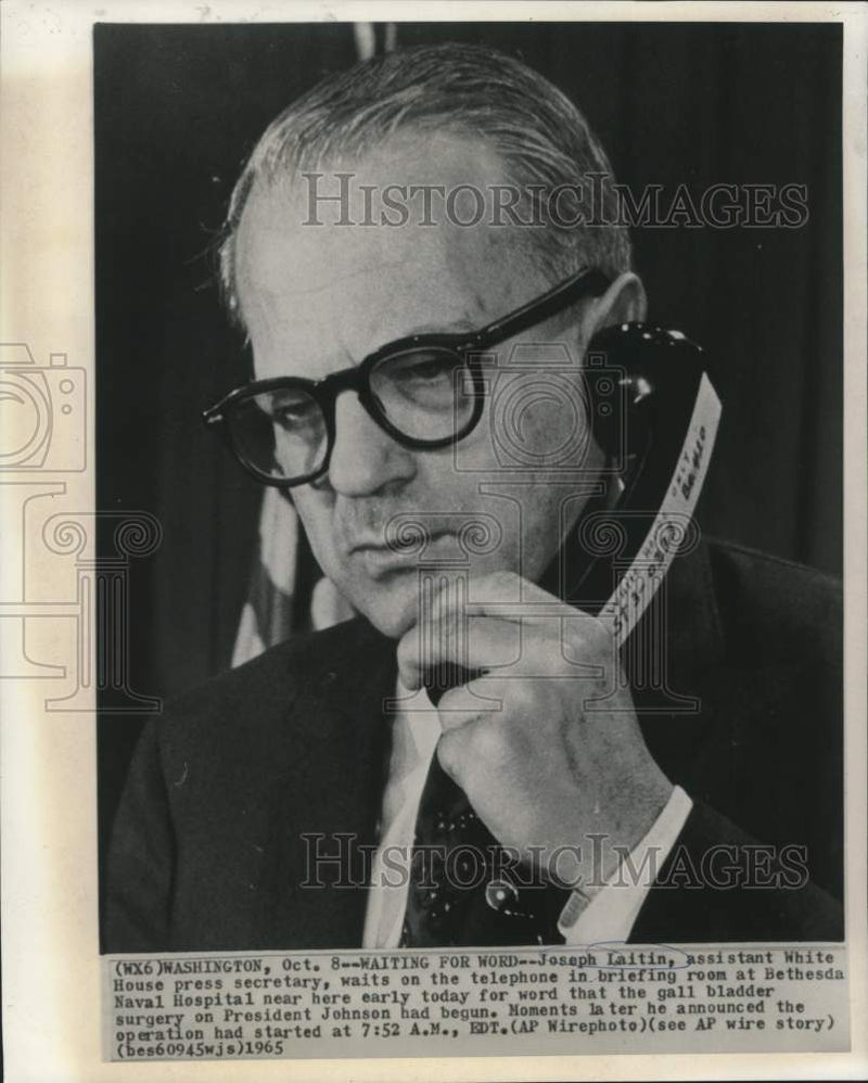 Load image into Gallery viewer, 1965 Press Photo Assistant White House Press Secretary Joseph Laitin on phone
