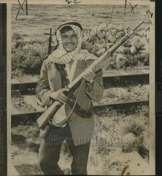 1958 Press Photo Lebanese youth guards railroad line at Sidon, Lebanon