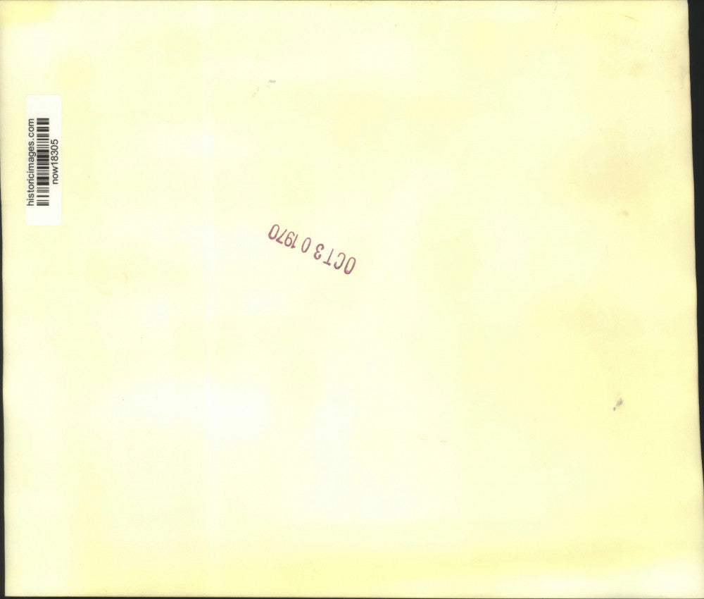 1970 Press Photo Child and mother pass rotting rubbish on London's Peter Street