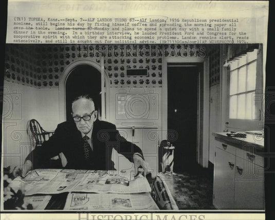 1974 Press Photo Alf Landon. turning interview, with morning coffee and paper