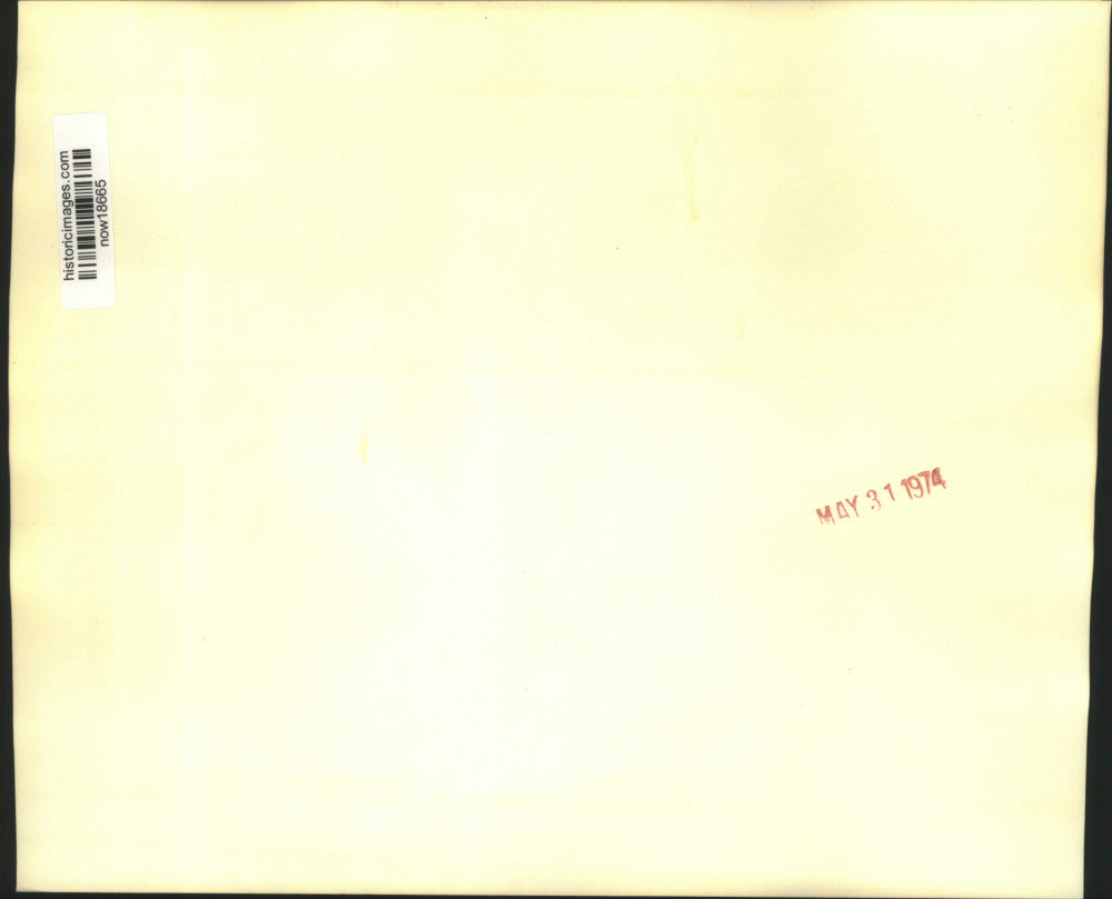 1974 Press Photo Senator Kennedy places flower of JFK's grave in Arlington