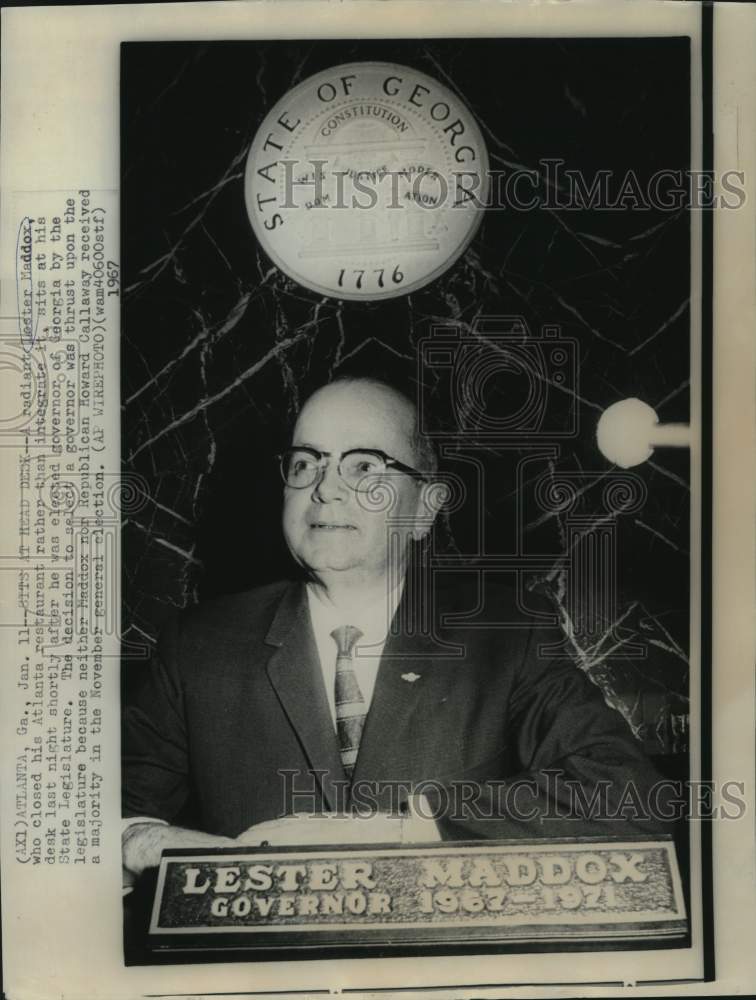 Load image into Gallery viewer, 1967 Press Photo Georgia Governor Lester Maddox sits at his desk in Atlanta
