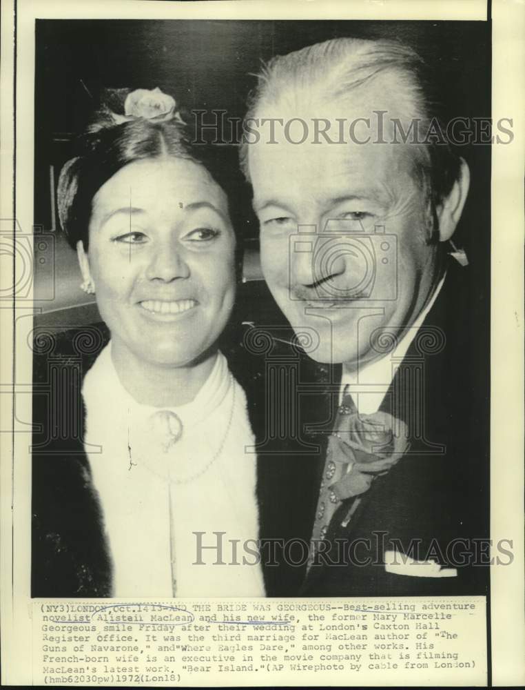 Load image into Gallery viewer, 1972 Press Photo Novelist Alisteil MacLean and wife Mary Marcelle in London

