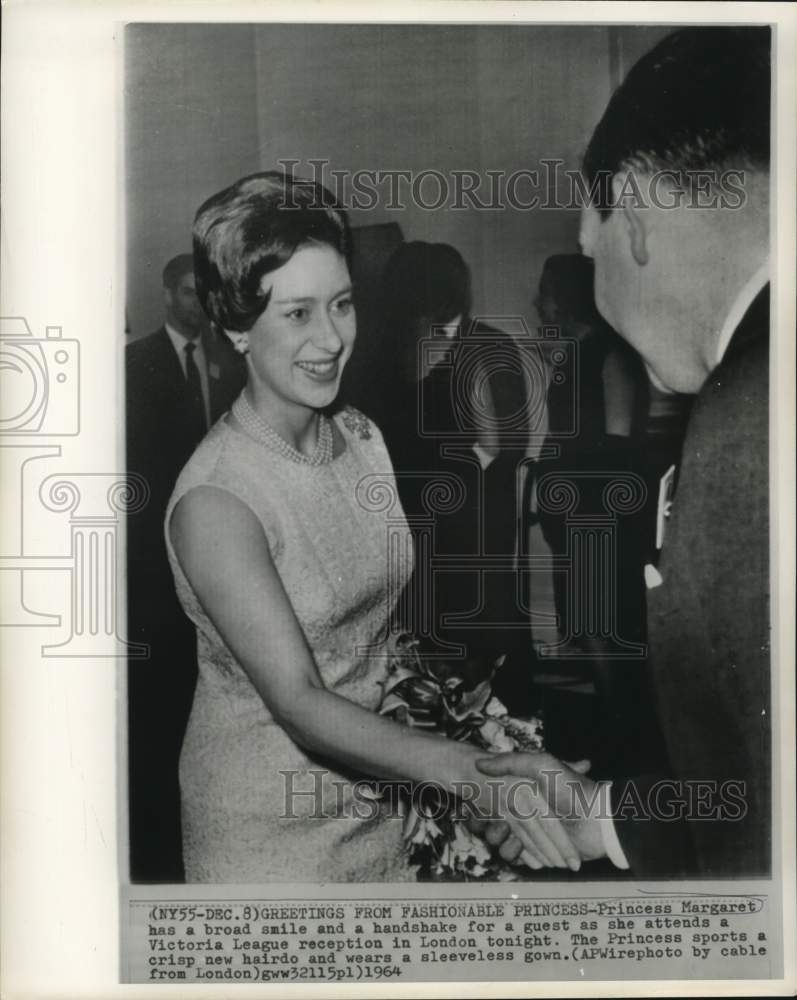 Load image into Gallery viewer, 1964 Press Photo Princess Margaret with guest at Victoria League reception.
