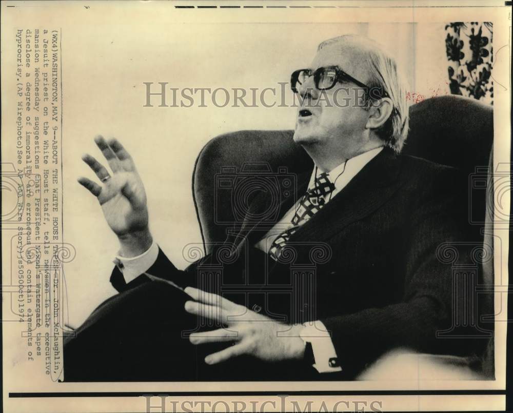 1974 Press Photo John McLaughlin talks Watergate at press conf., Washington DC