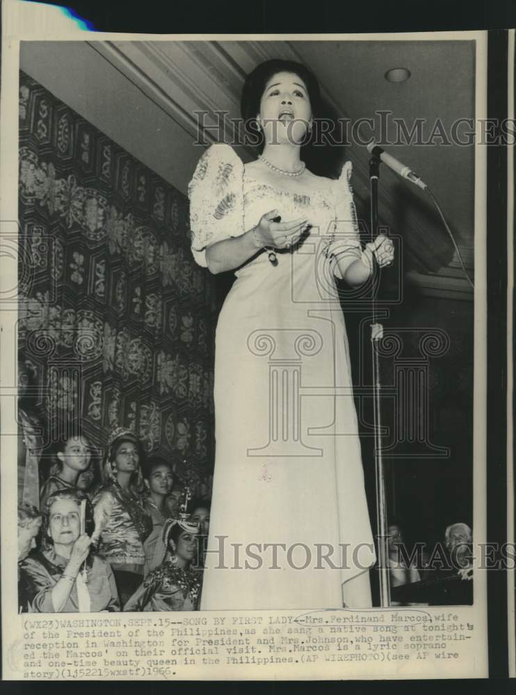 Load image into Gallery viewer, 1966 Press Photo Mrs. Ferdinand Marcos sings Philippine native song at reception
