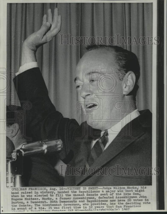 1967 Press Photo Judge Milton Marks with hand raised in victory. - now20458