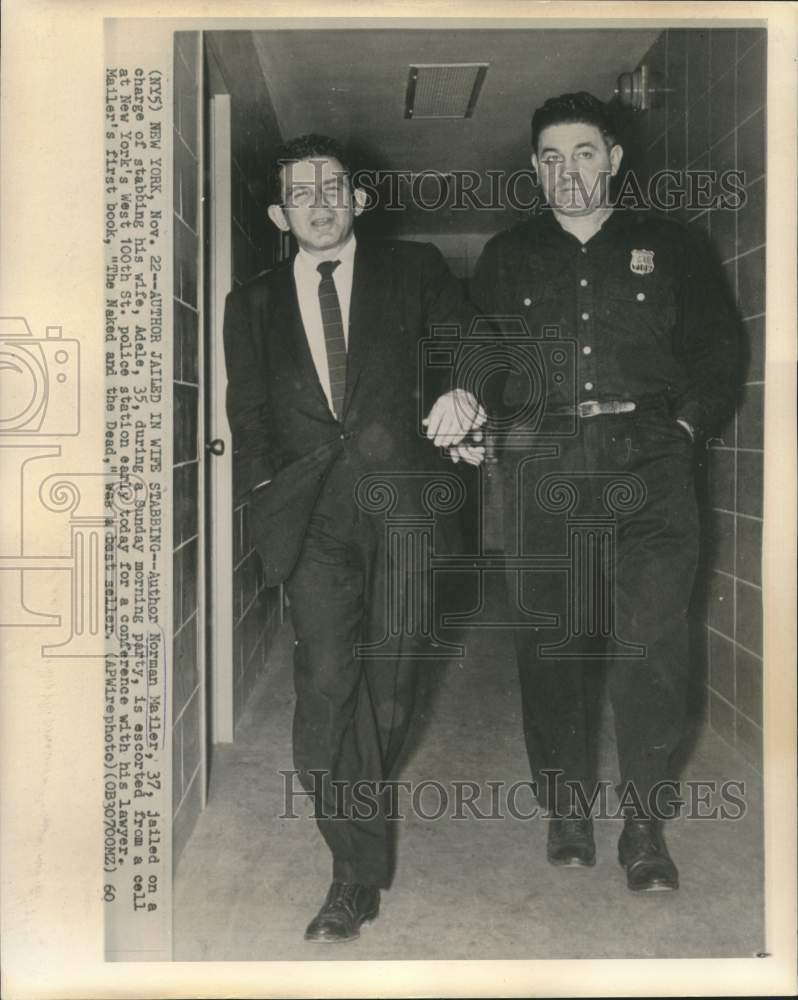 Load image into Gallery viewer, 1960 Press Photo Author Norman Mailer escorted from New York jail cell
