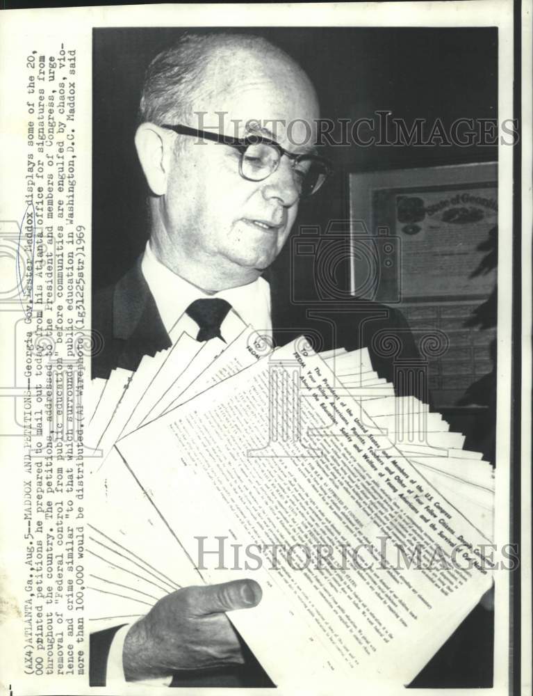 1969 Press Photo Governor Lester Maddox displays printed petitions at Capitol