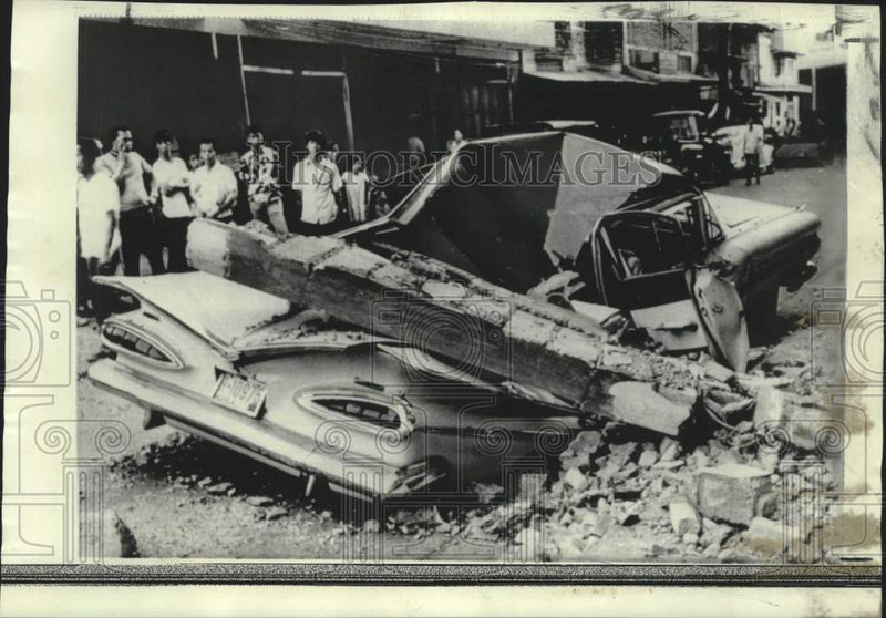 Load image into Gallery viewer, 1970 Press Photo Smashed up automobile after earthquake, Manila, Philippines
