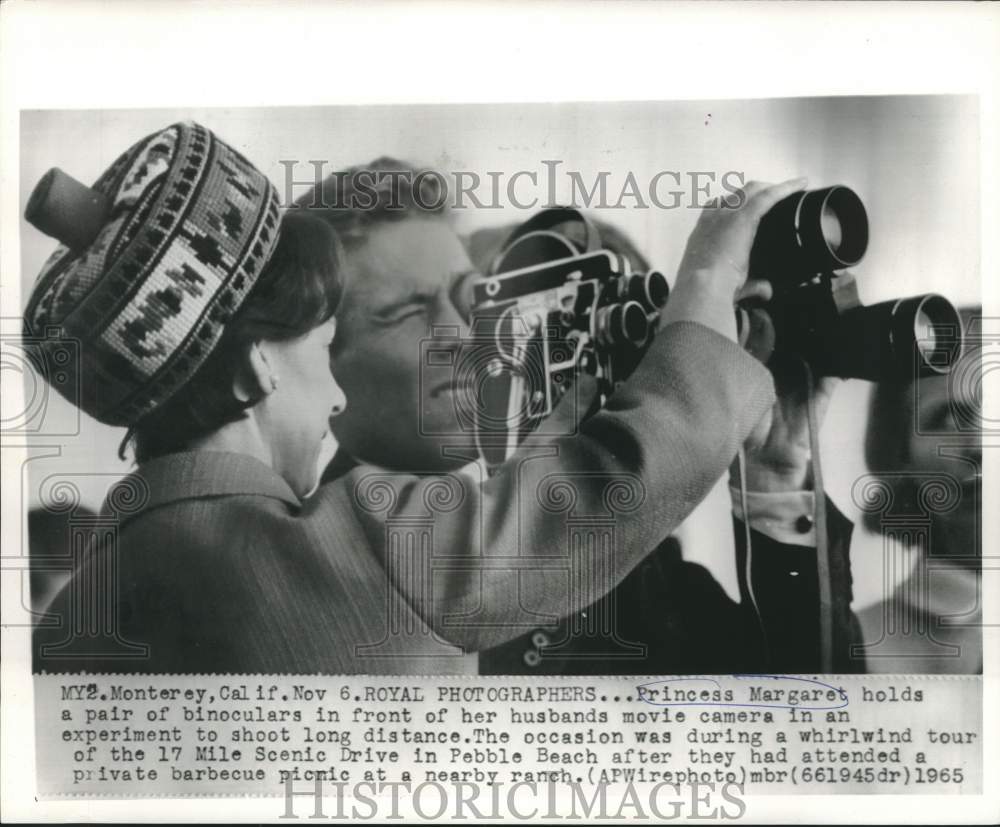 1965 Press Photo Princess Margaret hold binoculars in front of movie camera