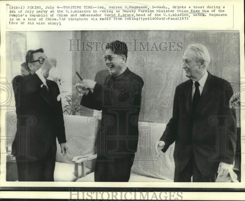 Load image into Gallery viewer, 1973 Press Photo Senator Magnuson and others drink toast at US Mission in Peking
