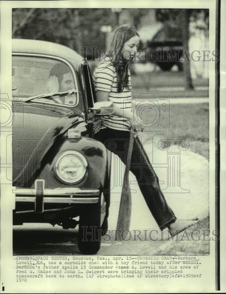 Load image into Gallery viewer, 1970 Press Photo Astronaut James Lovell's daughter Barbara chats with boyfriend.
