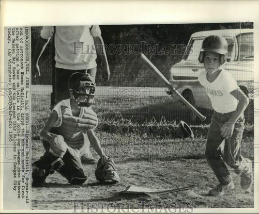 1965 Press Photo Astronaut James McDivitt's son Michael goes to first base