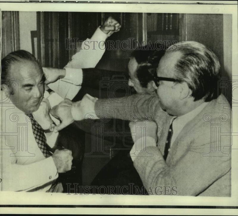 Load image into Gallery viewer, 1974 Press Photo Chile-Congressman Maturana trades punches over copper scandal
