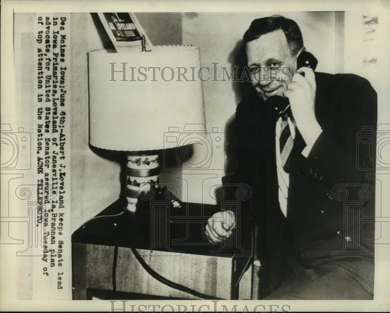 Load image into Gallery viewer, 1950 Press Photo Iowa Senator Albert Loveland talks on telephone - now22807
