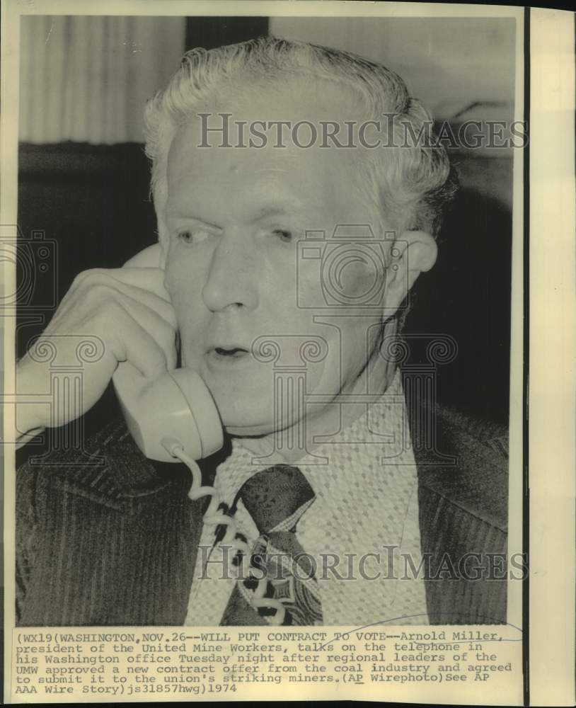 1974 Press Photo UMW President Arnold Miller talks on phone in Washington office