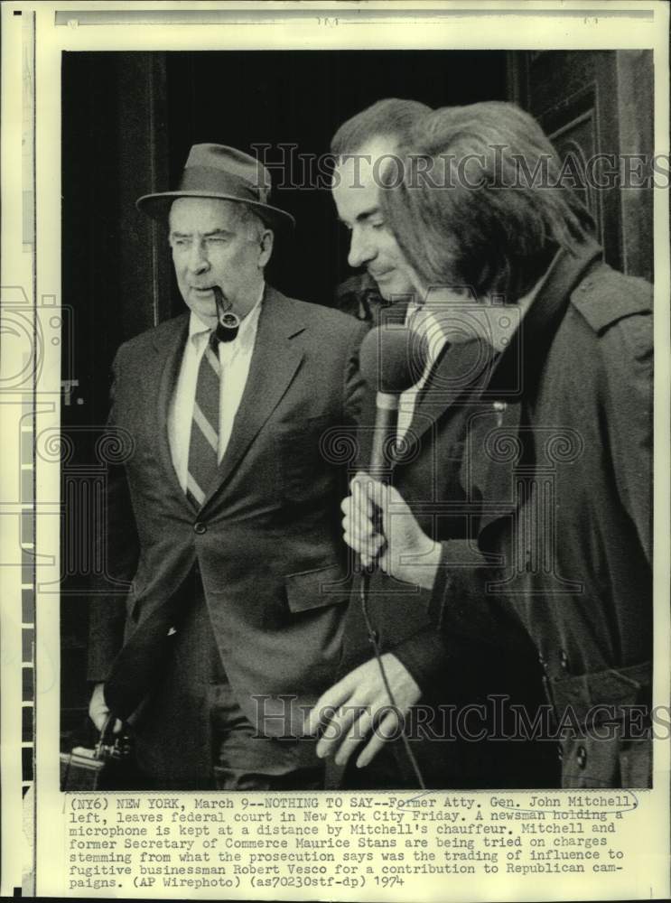 Load image into Gallery viewer, 1974 Press Photo Chauffeur keeps newsman from John Mitchell in New York
