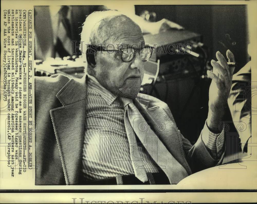 1973 Press Photo AFL-CIO President Meany smokes cigar during Washington intervie