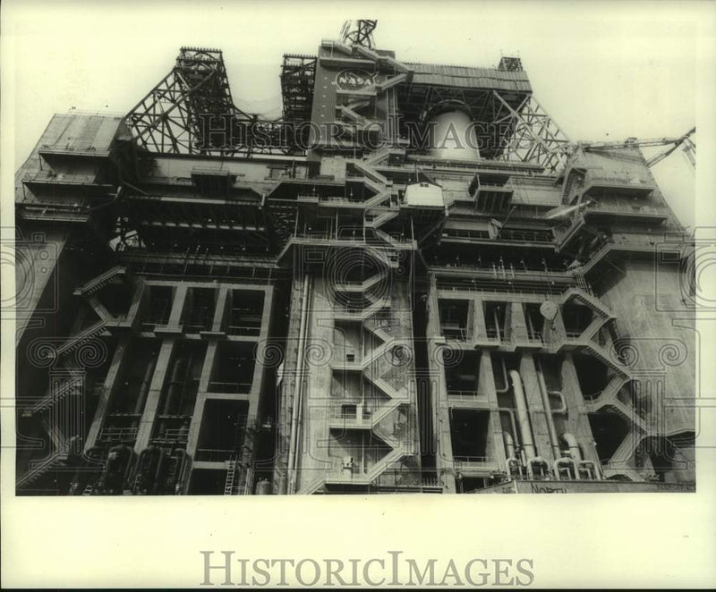 Load image into Gallery viewer, 1967 Press Photo S-1C rocket test stand is fourteen stories above scrub land
