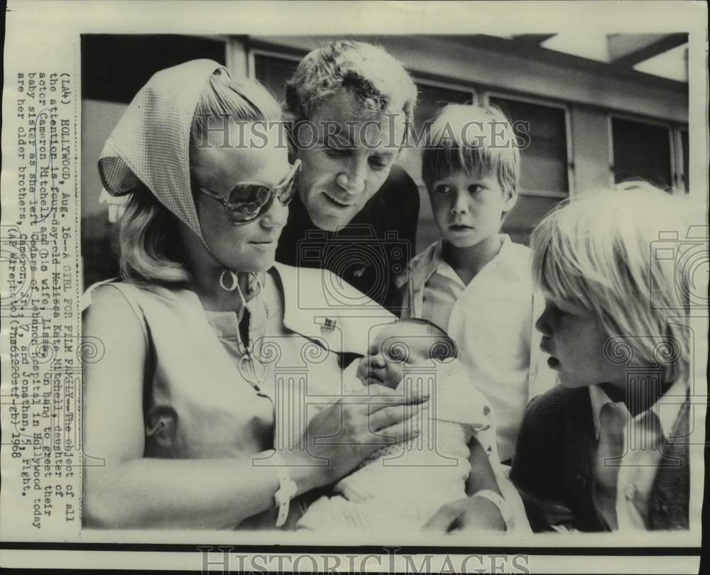 1968 Press Photo Actor Cameron Mitchell with infant daughter and wife and sons