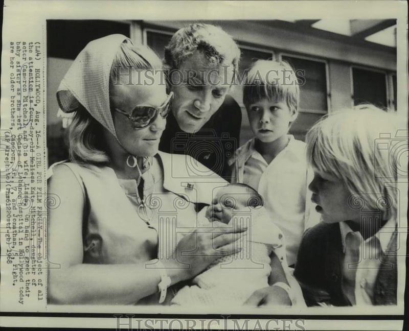 Load image into Gallery viewer, 1968 Press Photo Actor Cameron Mitchell with infant daughter and wife and sons
