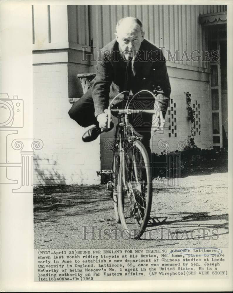 1963 Press Photo Owen Lattimore rides bicycle at Ruston, Maryland home- Historic Images