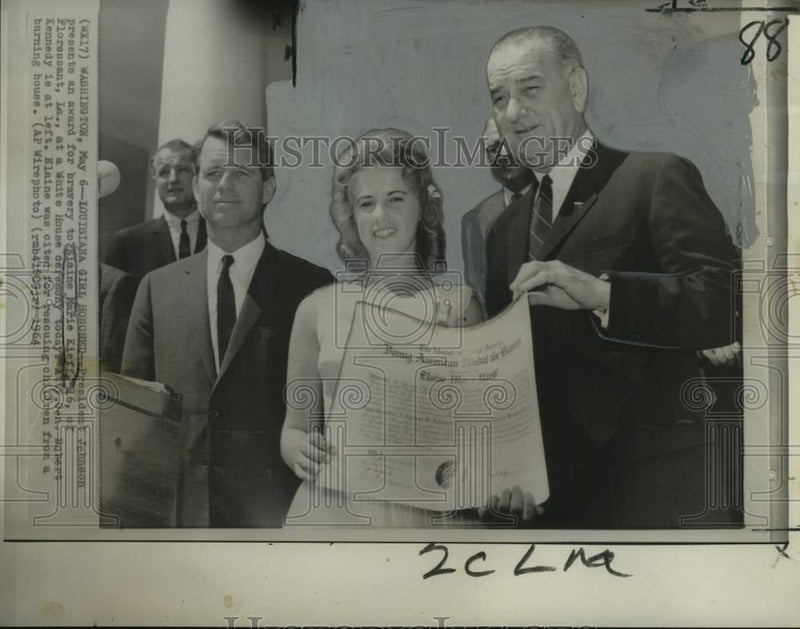 Load image into Gallery viewer, 1964 Press Photo President Johnson honors Elaine Marie Kieff for bravery
