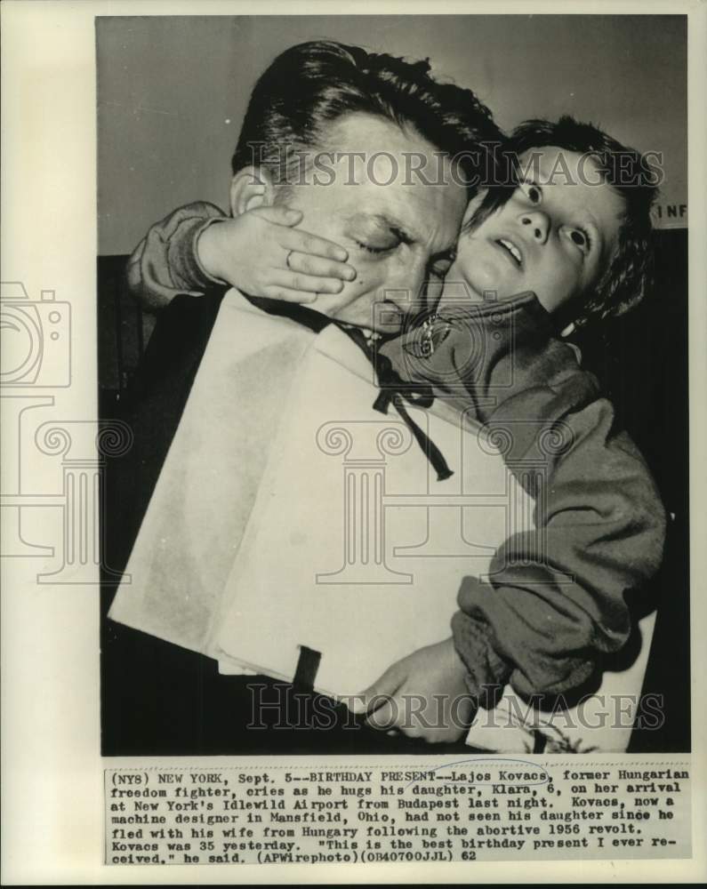 1962 Press Photo Lajos Kovacs hugs daughter Klara, he hasn't seen since 1956