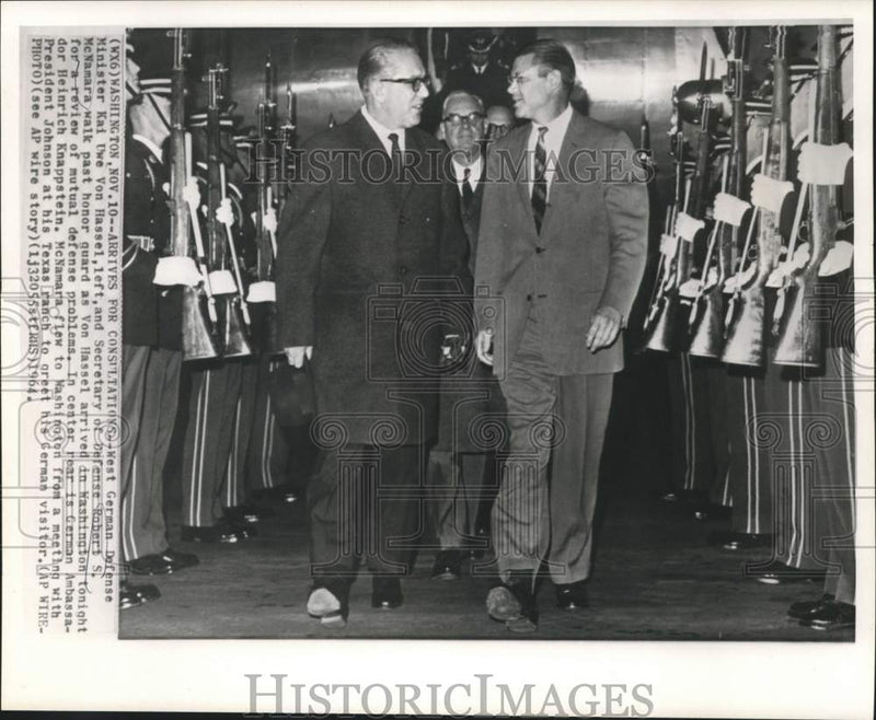 Load image into Gallery viewer, 1964 Press Photo Von Hassel and Robert McNamara walk past honor guard
