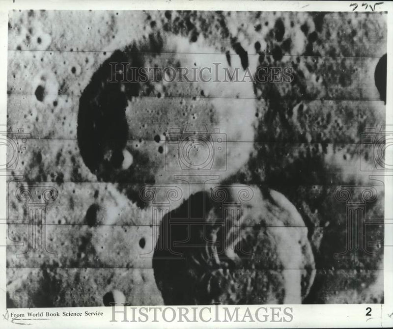 Load image into Gallery viewer, 1970 Press Photo Dr. Allen Mills twin crater creation similar to moon craters
