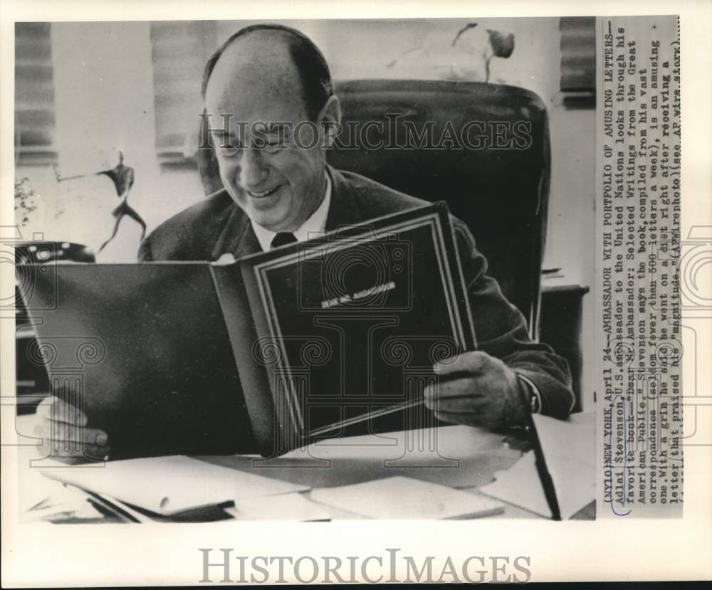 1964 Press Photo Adlai Stevenson looks through his book of amusing letters
