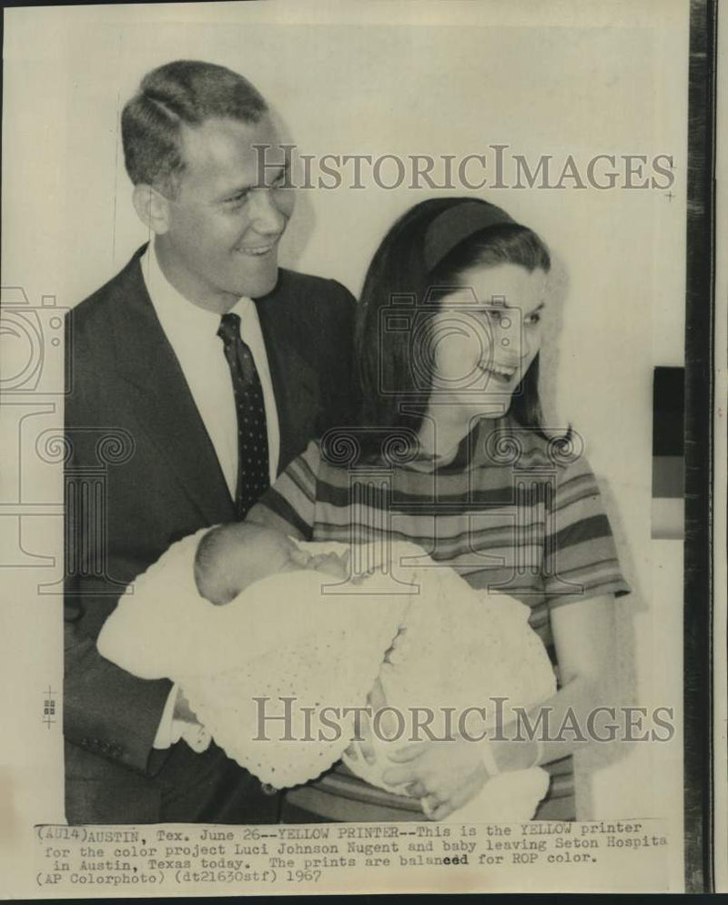 Load image into Gallery viewer, 1967 Press Photo Luci and Patrick Nugent leave Seton Hospital with infant son
