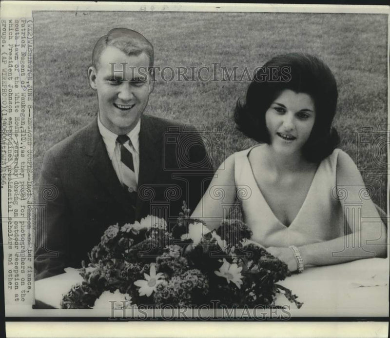 Load image into Gallery viewer, 1966 Press Photo Luci Johnson and Pat Nugent pose on White House south lawn
