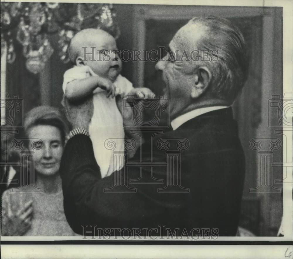 1967 Press Photo President Johnson holds first grandchild at the White House