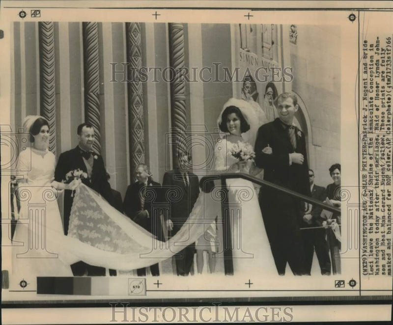 Load image into Gallery viewer, 1966 Press Photo Patrick and Luci Nugent with attendants leave Washington church
