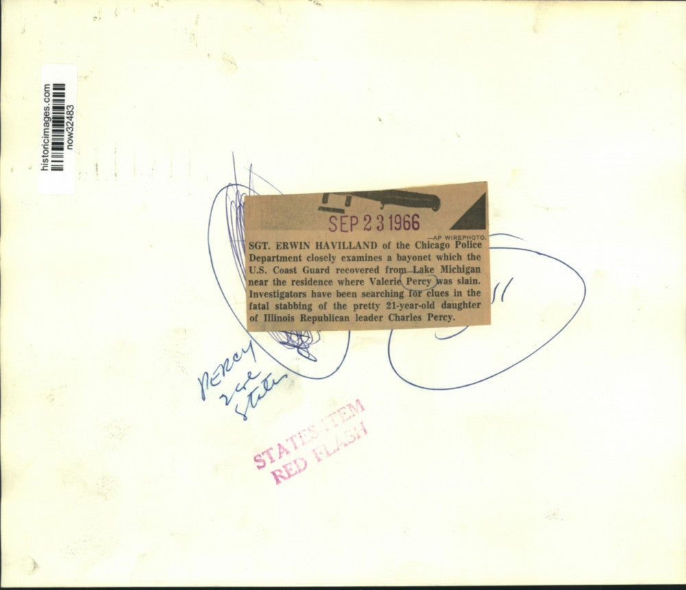 1966 Press Photo Sgt, Havilland examines bayonet recovered from Lake Michigan