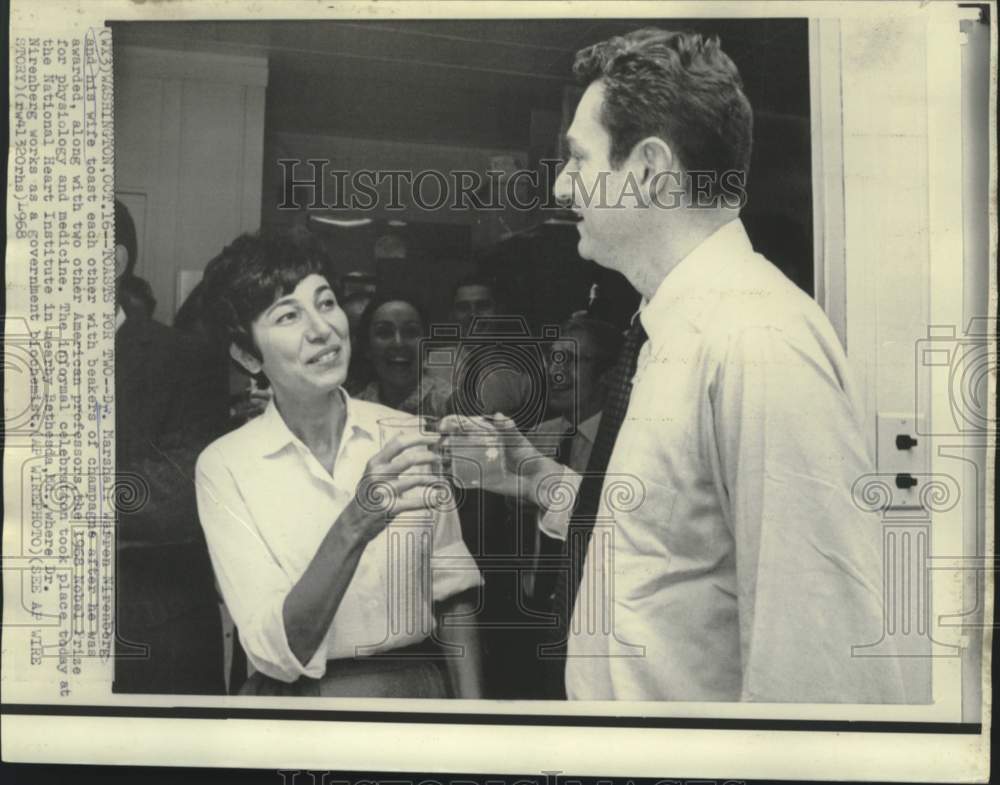 1968 Press Photo Champagne toast for Nobel winner Dr. Nirenberg and wife in MD