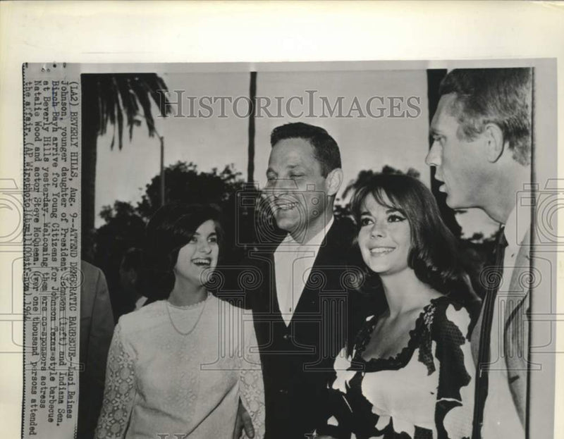 Load image into Gallery viewer, 1964 Press Photo Luci Johnson, Senator Bayh, Natalie Wood &amp; Steve McQueen at BBQ
