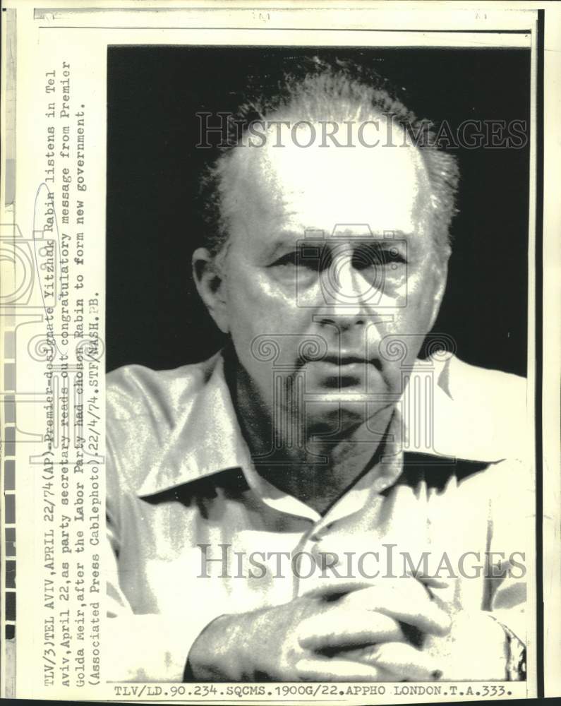 Load image into Gallery viewer, 1974 Press Photo Premier-designate Yitzhak Rabin listens to Golda Meir message

