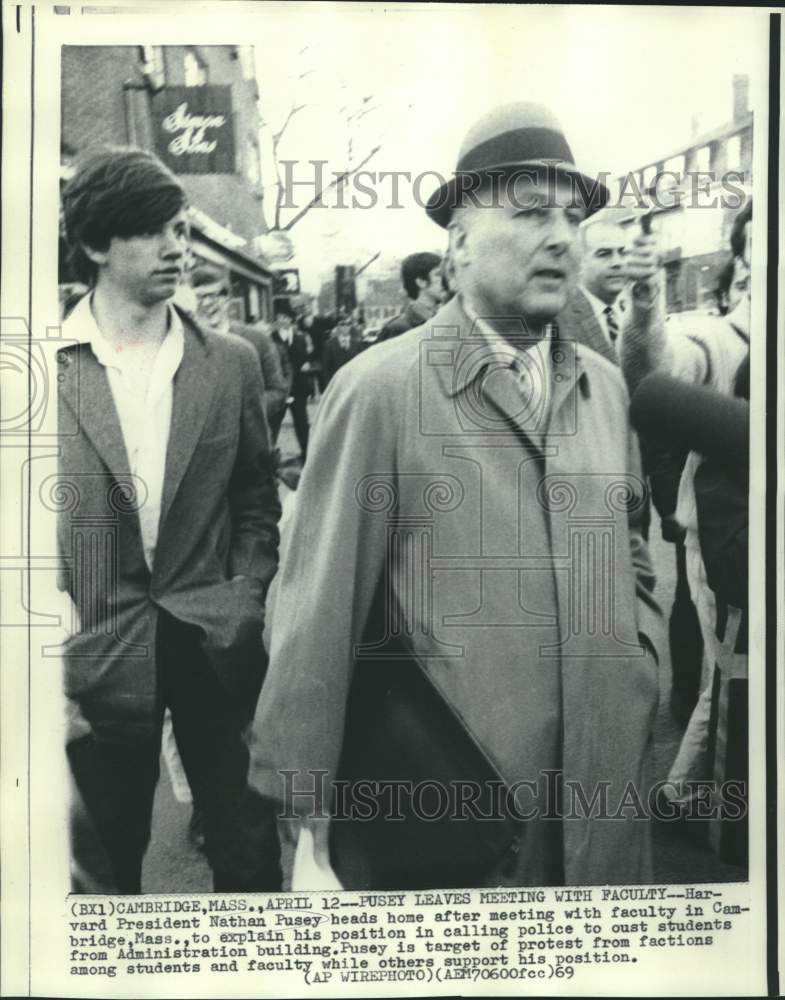 Load image into Gallery viewer, 1969 Press Photo Harvard President Nathan Pusey leaves Cambridge meeting
