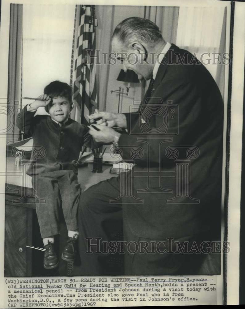 Load image into Gallery viewer, 1967 Press Photo Poster child Paul Terry Pryor holds gift from President Johnson
